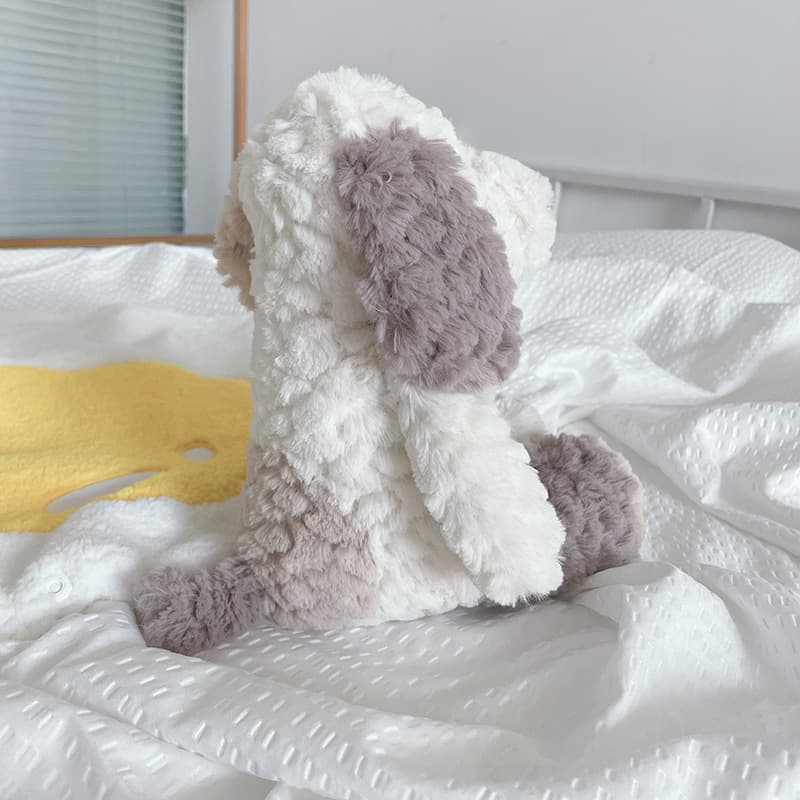 ふわふわ巻き毛の愛らしいトイプードルぬいぐるみ